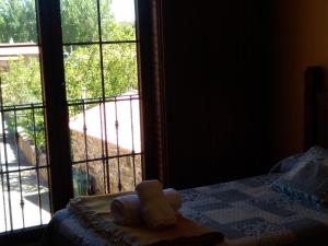 Letto o letti in una camera di La Posada de Toribia