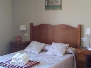Un pat sau paturi într-o cameră la La Posada de Toribia