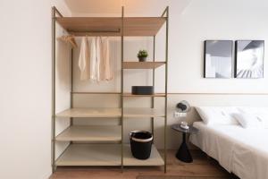 Posteľ alebo postele v izbe v ubytovaní Petit Luxe Tobella Baixos