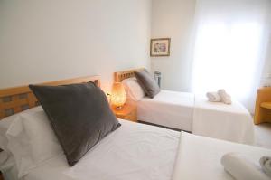 Postel nebo postele na pokoji v ubytování Luxury Beach House