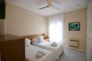 Postel nebo postele na pokoji v ubytování Luxury Beach House