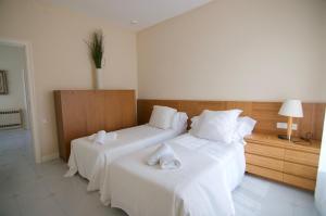 Postel nebo postele na pokoji v ubytování Luxury Beach House