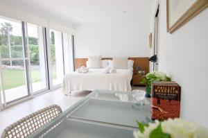 Postel nebo postele na pokoji v ubytování Luxury Beach House