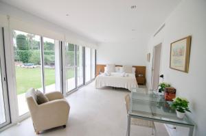 Postel nebo postele na pokoji v ubytování Luxury Beach House + 37 fotografií