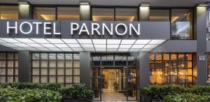 a hotel parron sign in front of a building at Parnon Hotel in Athens