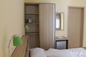 Letto o letti in una camera di Okro Life