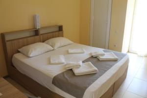 Letto o letti in una camera di Okro Life