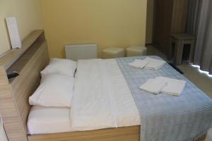 Letto o letti in una camera di Okro Life