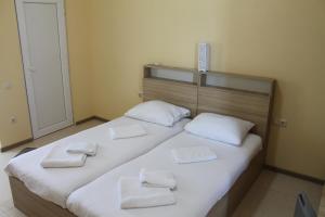 Letto o letti in una camera di Okro Life
