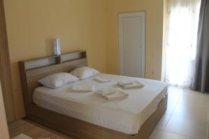 Letto o letti in una camera di Okro Life