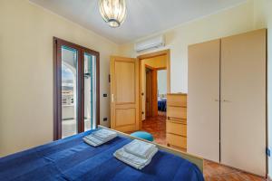 Cama o camas de una habitación en Le Residenze Del Porto
