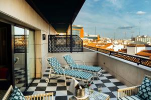 En balkon eller terrasse på The First One Madrid Preciados