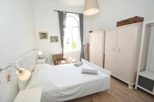 Posteľ alebo postele v izbe v ubytovaní Central apartment with beautiful sea view