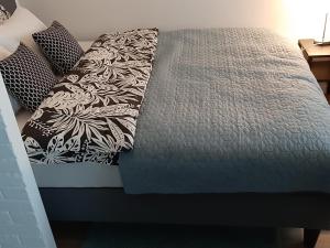 Postel nebo postele na pokoji v ubytování Apartament Zamojska - GarwoNocka