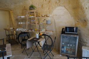Reštaurácia alebo iné gastronomické zariadenie v ubytovaní 5 Elementi Sassi Matera