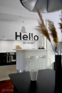 Kuchyňa alebo kuchynka v ubytovaní APARTAMENT TARASY GDYNI z OGRÓDKIEM