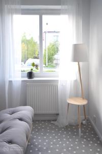 Posedenie v ubytovaní APARTAMENT TARASY GDYNI z OGRÓDKIEM