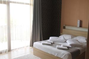 Letto o letti in una camera di Okro Life