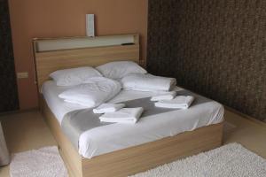 Letto o letti in una camera di Okro Life