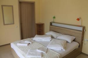 Letto o letti in una camera di Okro Life