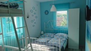Posteľ alebo postele v izbe v ubytovaní Sunshine apartman