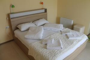 Letto o letti in una camera di Okro Life