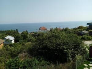 a view of the ocean from a village at Casa Del Grey in Balchik