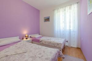 Posteľ alebo postele v izbe v ubytovaní House Lara