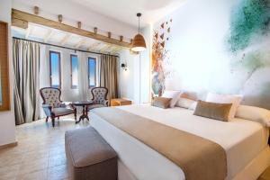Postel nebo postele na pokoji v ubytování Hotel Servigroup Montíboli