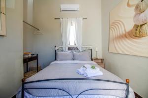 Postel nebo postele na pokoji v ubytování Mentas Country Villa