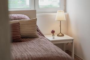 Postel nebo postele na pokoji v ubytování Apartament Cupuacu