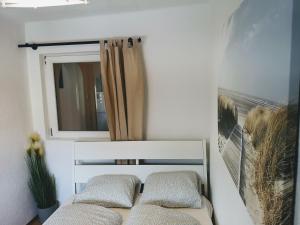 Giường trong phòng chung tại Sankt-Nikolaus Old Town City Apartment