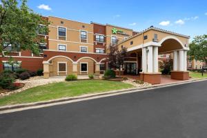 a rendering of a hotel with a road in front at Extended Stay America Premier Suites - Charlotte - Pineville - Pineville Matthews Rd. in Charlotte