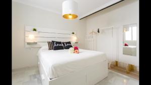 A bed or beds in a room at Apartamento semi-industrial palacio Castilla