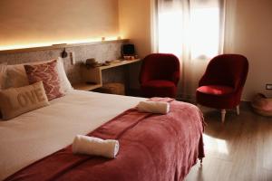 Posteľ alebo postele v izbe v ubytovaní Hotel Sant Joan