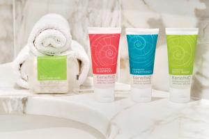 a group of four products sitting on a bathroom counter at Hyatt Zilara Rose Hall Adults Only - All Inclusive in Montego Bay