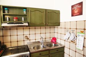 مطبخ أو مطبخ صغير في appartamento delle rose
