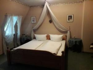 Postel nebo postele na pokoji v ubytování Hotel Feiler + 37 fotografií