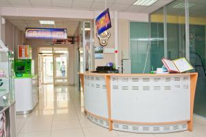 a store with a counter in a shopping mall at Grand City Hotel in Chita