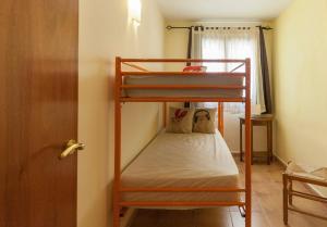 Postel nebo postele na pokoji v ubytování Lets Holidays apartment Tarull
