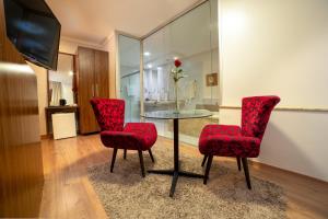 TV a/nebo společenská místnost v ubytování Hotel Porto Madeira