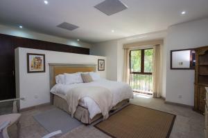 Cama o camas de una habitación en Condos & Penthouse El Caracol