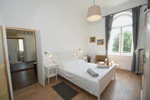 Posteľ alebo postele v izbe v ubytovaní Central apartment with beautiful sea view