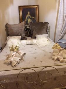 מיטה או מיטות בחדר ב-Regina Di Girgenti