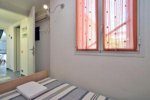 Posteľ alebo postele v izbe v ubytovaní Residenze San Paolo # beach