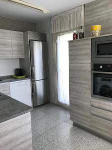 A kitchen or kitchenette at Casa rural Villa Verde