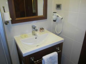 Um banheiro em Hotel Perula & SPA