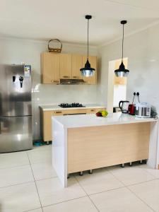 Η κουζίνα ή μικρή κουζίνα στο Cluster 59 Issa