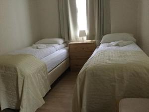 Katil atau katil-katil dalam bilik di Guesthouse Stekkatún