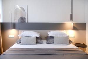 Postel nebo postele na pokoji v ubytování Apartments HUGO 2